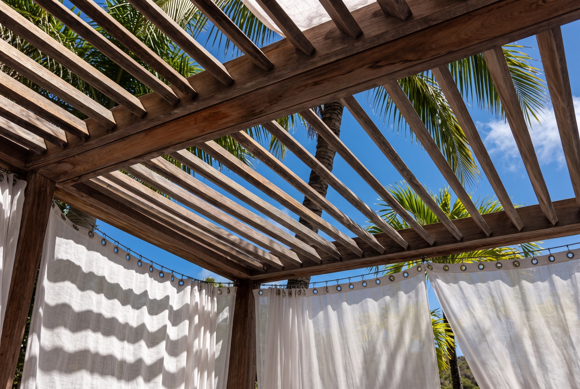 Looking up through the pergola to the sky